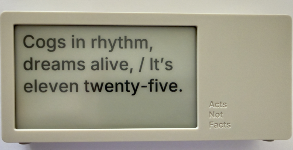 photo of poem clock displaying Cogs in rhythm, dreams alife, It's Eleven twentry-five.'