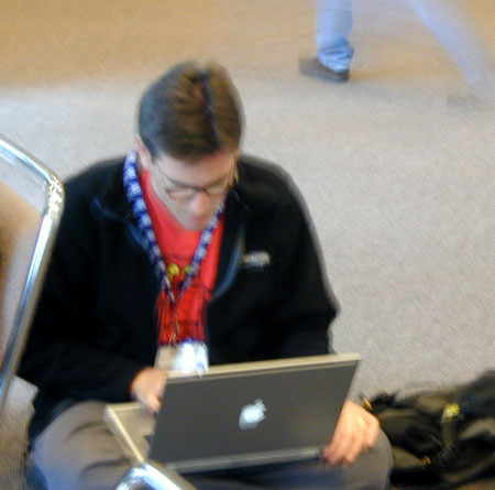 Matt is possibly blogging wirelessly on his TiBook.